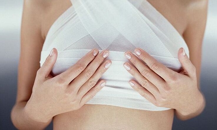 Bandage breasts after breast augmentation surgery